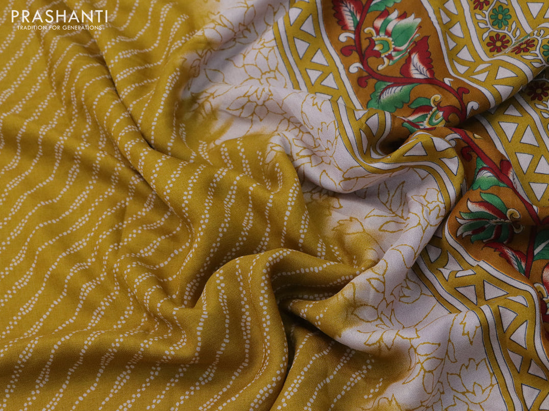 Semi georgette saree mustard yellow with allover prints and long zari woven border