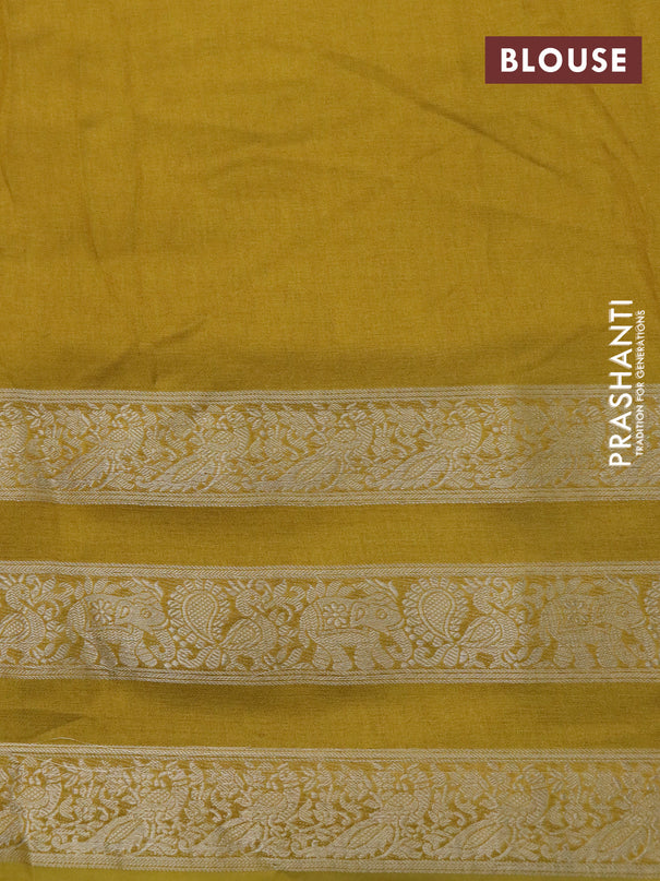 Semi georgette saree mustard yellow with allover prints and long zari woven border