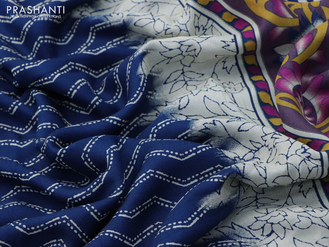 Semi georgette saree cs blue with allover zig zag prints and long zari woven border