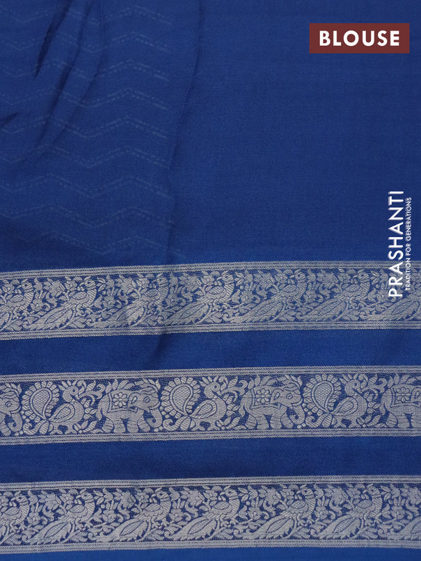 Semi georgette saree cs blue with allover zig zag prints and long zari woven border