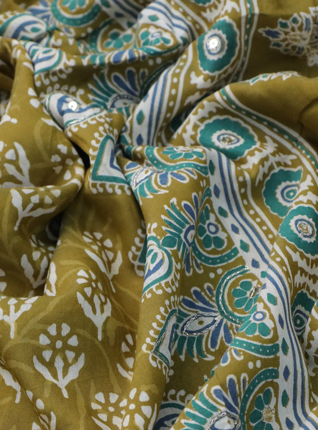 Muslin silk saree mehendi green and teal green with allover dabu prints & pita work and ajrakh printed border