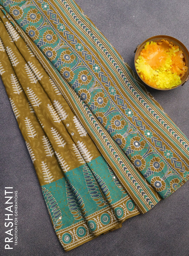 Muslin silk saree mehendi green and green with allover dabu prints & pita work and ajrakh printed border