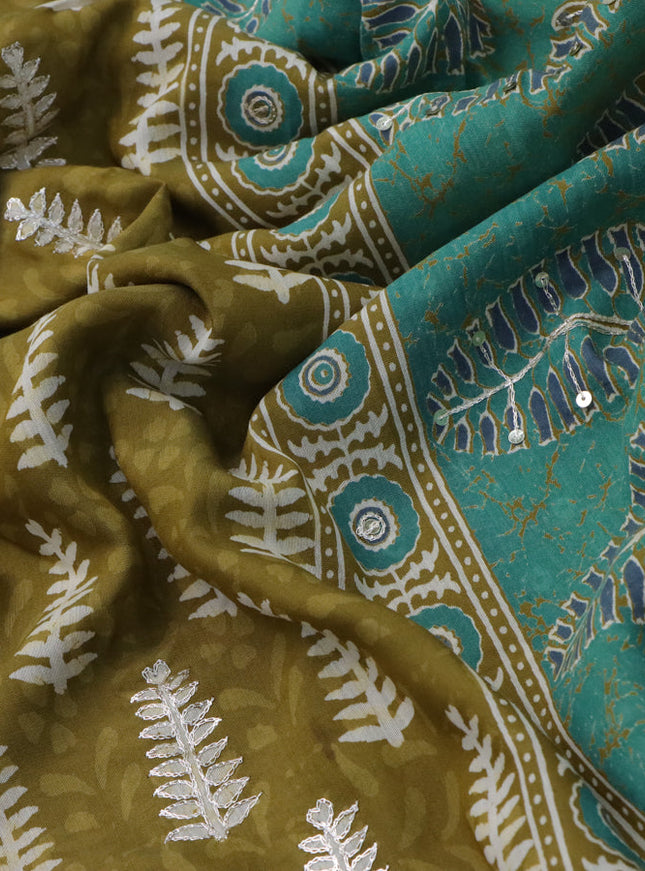 Muslin silk saree mehendi green and green with allover dabu prints & pita work and ajrakh printed border