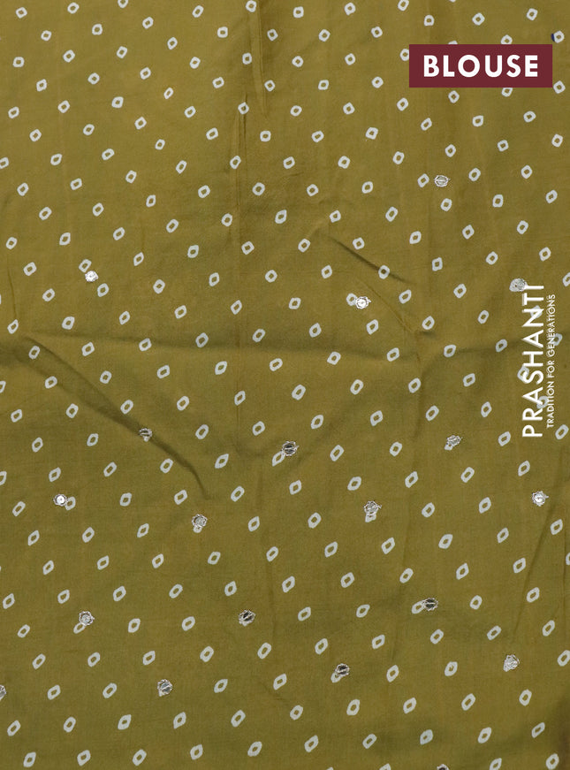 Muslin silk saree mehendi green and teal green with allover dabu prints & pita work and ajrakh printed border