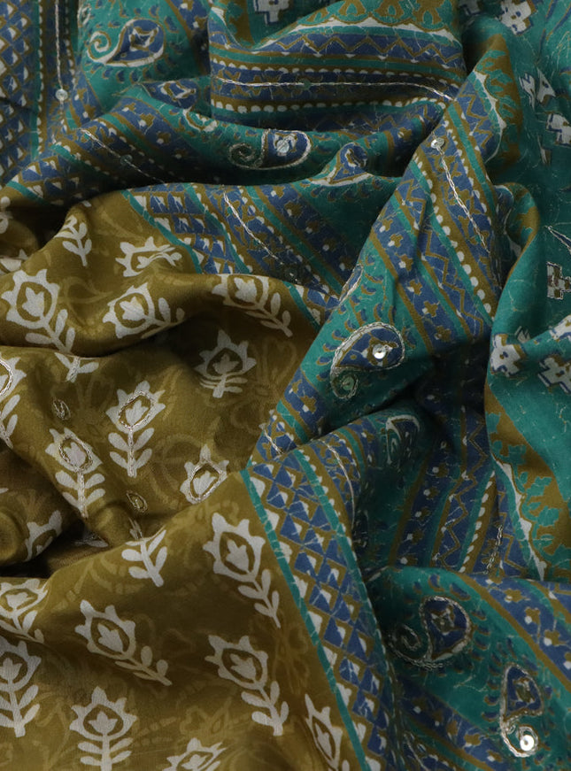 Muslin silk saree mehendi green and green with allover dabu prints & pita work and ajrakh printed border