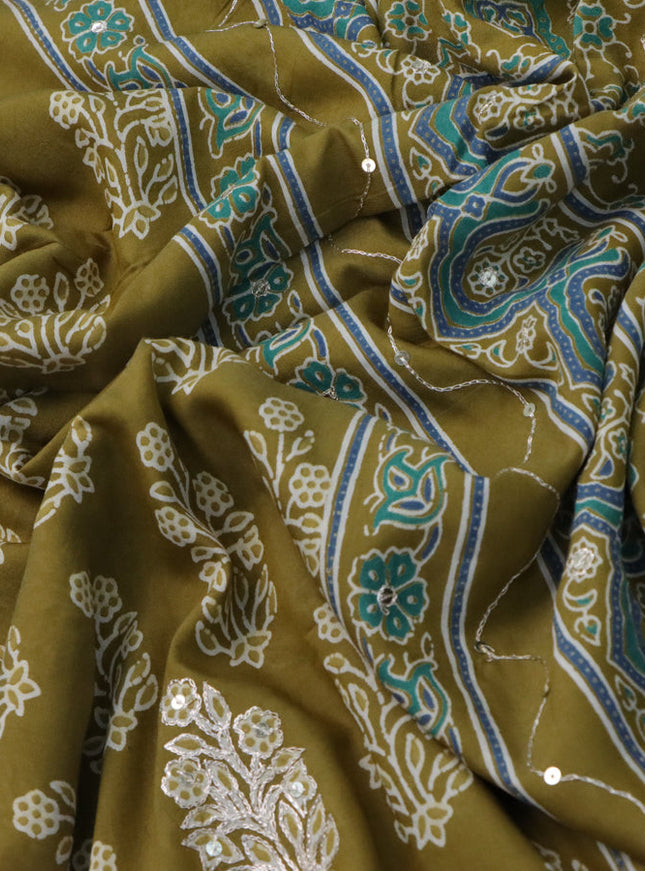 Muslin silk saree mehendi green and green with floral butta prints & pita prints and ajrakh printed border