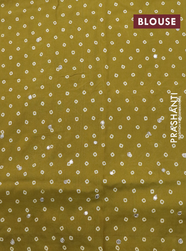 Muslin silk saree mehendi green and green with floral butta prints & pita prints and ajrakh printed border