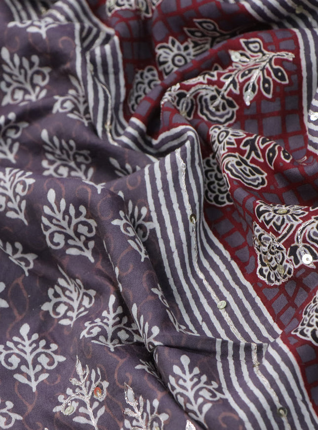 Muslin silk saree grey shade with allover dabu prints & pita work and ajrakh printed border