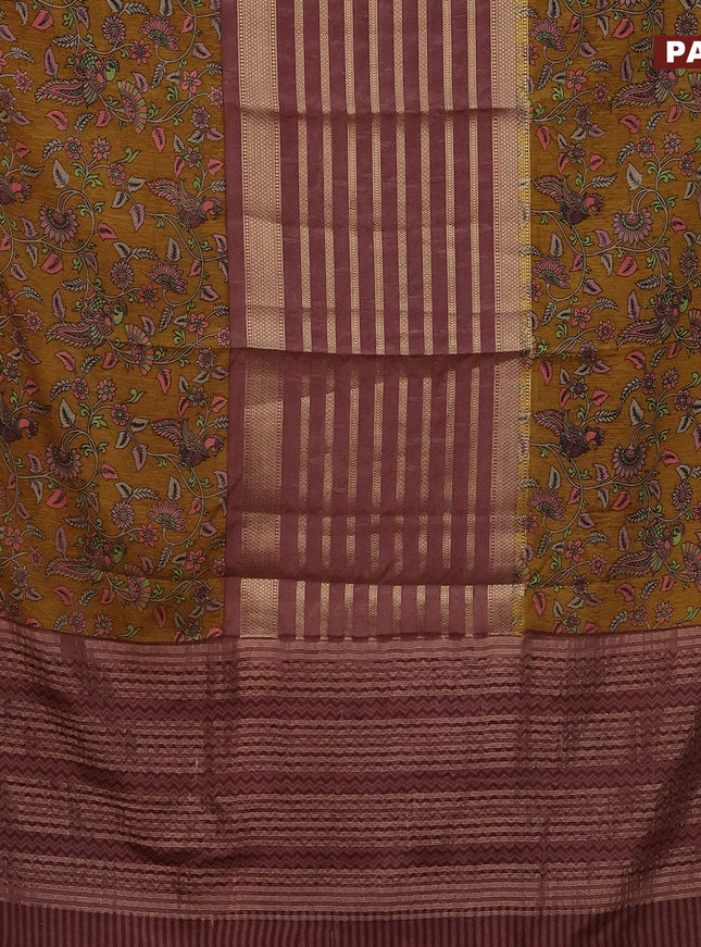 Semi crepe saree pastel brown and dark mustard with zari weaves and long kalamkari printed zari border