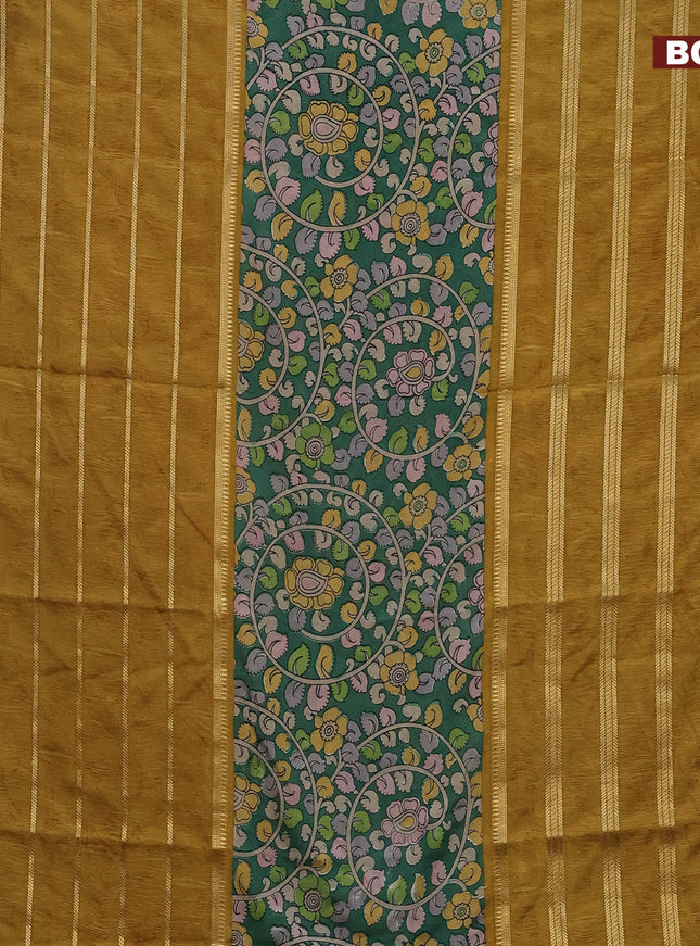 Semi crepe saree green and dark mustard with kalamkari prints and long zari woven simple border