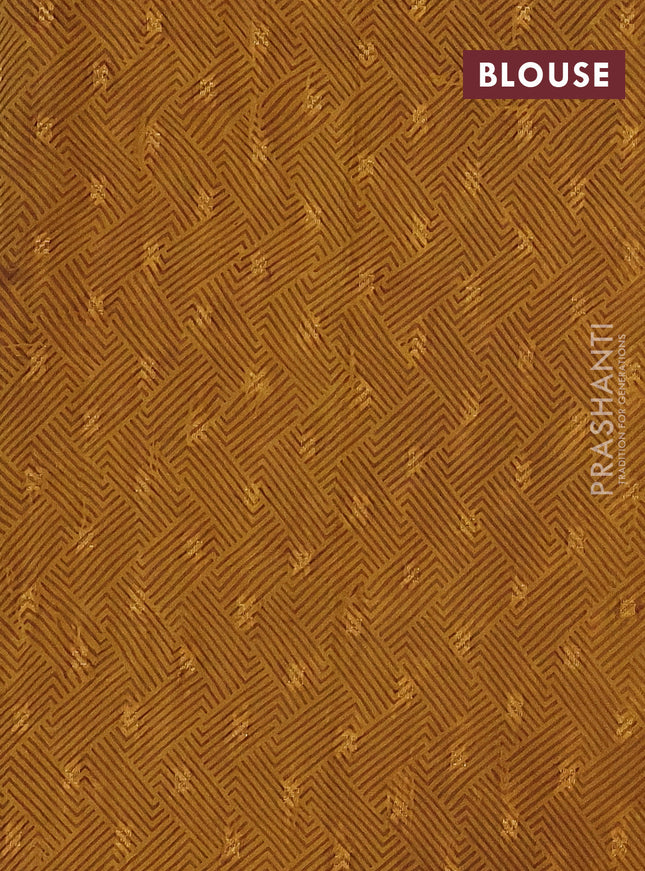 Semi crepe saree mustard shade and green with kalamkari prints and long zari woven simple border