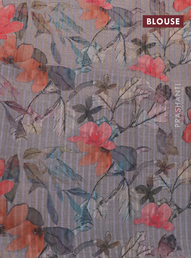 Semi tussar saree grey with allover zari woven veldhari design and floral printed border