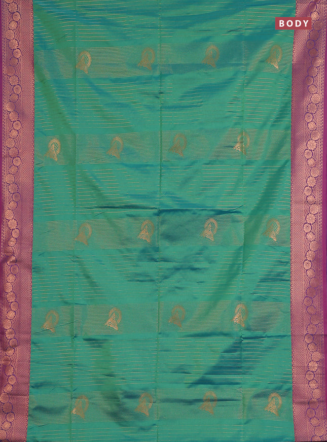 Semi soft silk saree dual shade of green and dual shade of purple with allover copper zari weaves and copper zari woven border