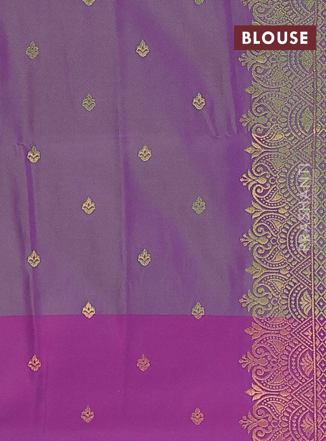 Semi soft silk saree dual shade of green and dual shade of purple with allover copper zari weaves and copper zari woven border