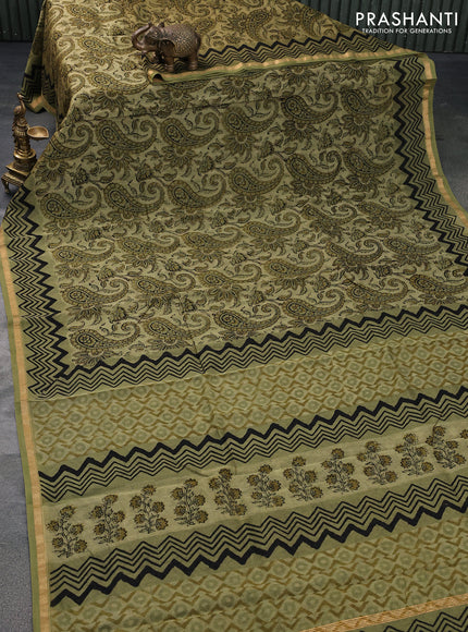 Chanderi bagru saree sap green shade with allover kalamkari prints and small zari woven border