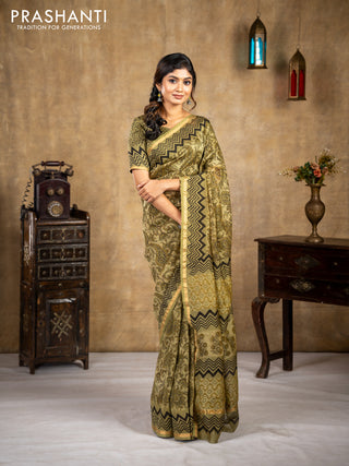 Chanderi bagru saree sap green shade with allover kalamkari prints and small zari woven border