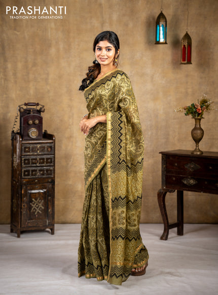 Chanderi bagru saree sap green shade with allover kalamkari prints and small zari woven border
