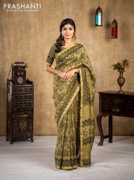 Chanderi bagru saree sap green shade with allover kalamkari prints and small zari woven border