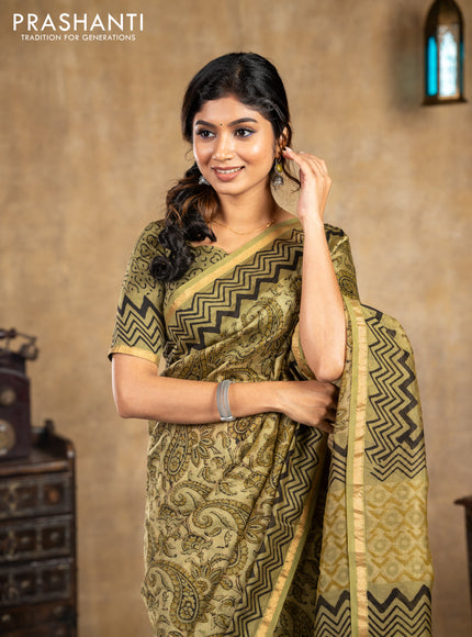 Chanderi bagru saree sap green shade with allover kalamkari prints and small zari woven border