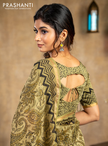 Chanderi bagru saree sap green shade with allover kalamkari prints and small zari woven border
