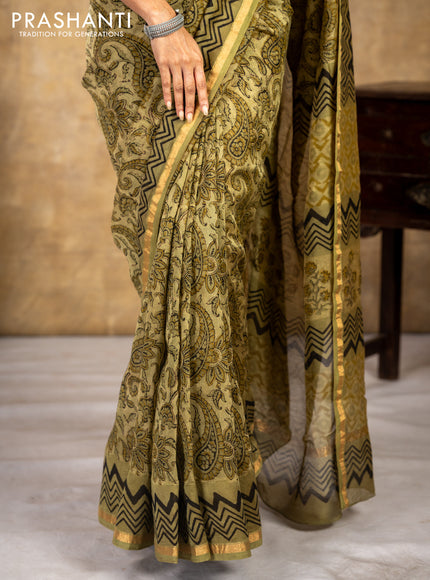 Chanderi bagru saree sap green shade with allover kalamkari prints and small zari woven border