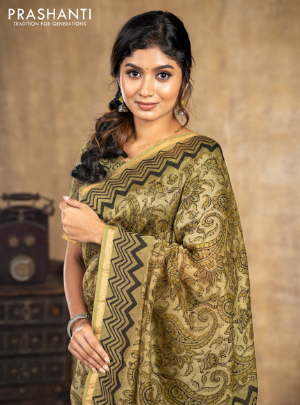 Chanderi bagru saree sap green shade with allover kalamkari prints and small zari woven border