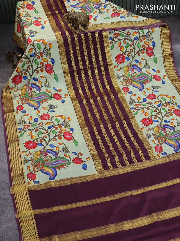 Pure mysore silk saree wine shade and pista green with zari weaves and long kalamkari printed zari border
