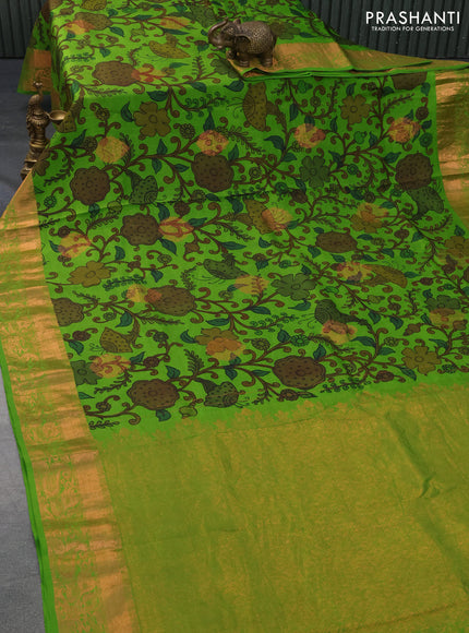 Pure kanchipuram silk saree light green with allover pen kalamkari prints & zari buttas and copper zari woven border