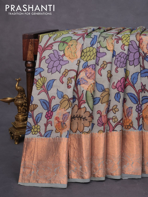 Pure kanchipuram silk saree grey shade with allover pen kalamkari prints & zari buttas and copper zari woven border