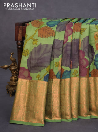 Pure kanchipuram silk saree green with allover pen kalamkari prints and copper zari woven border