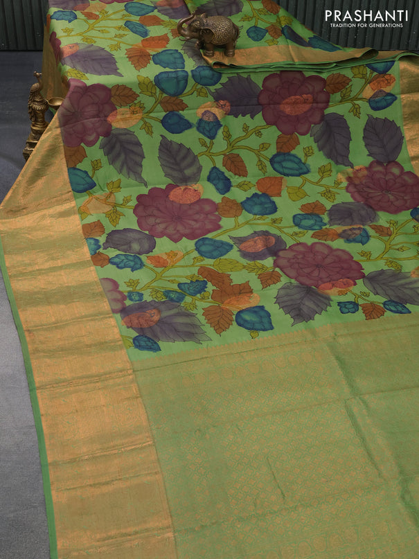 Pure kanchipuram silk saree green with allover pen kalamkari prints and copper zari woven border