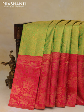 Pure kanchipuram tissue silk saree light green and pink with allover zari woven brocade weaves and long zari woven border