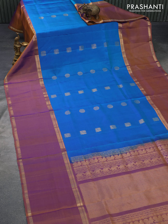 Pure soft silk saree dual shade of cs blue and dual shade of rust with annam & rudhraksha zari woven buttas and long rettapet zari woven border
