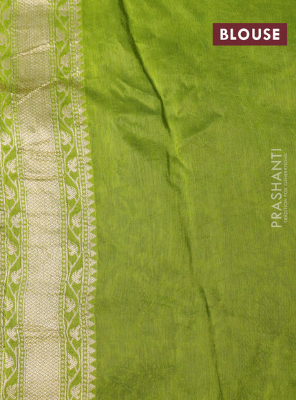 Semi tussar silk saree bottle green and light green with thread & zari woven buttas and floral design buttas & beaded work border