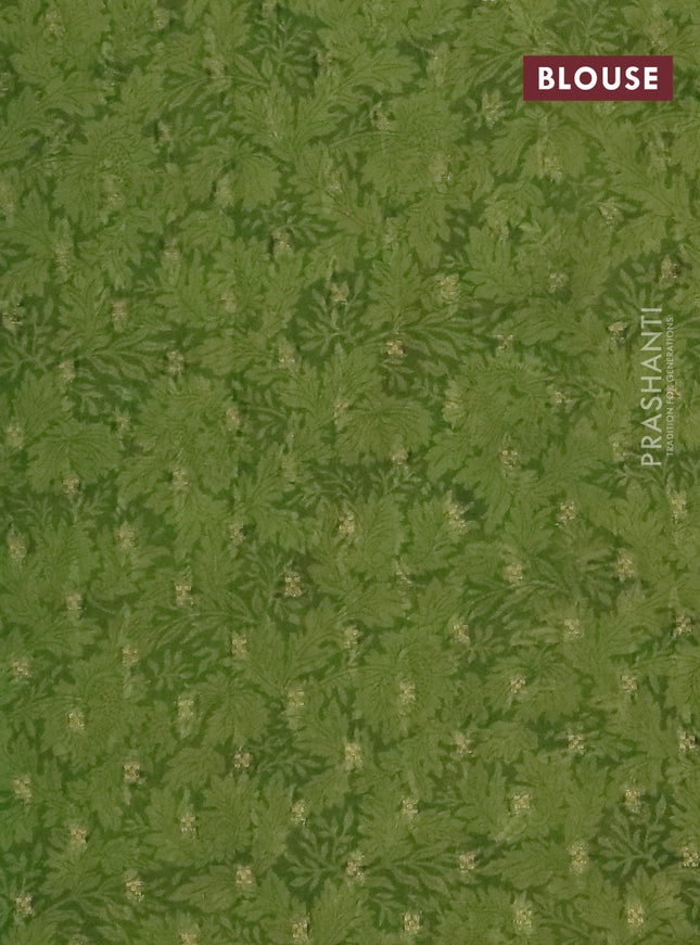 Semi crepe saree green and mehendi green with ikat prints & zari stripes and zari woven border