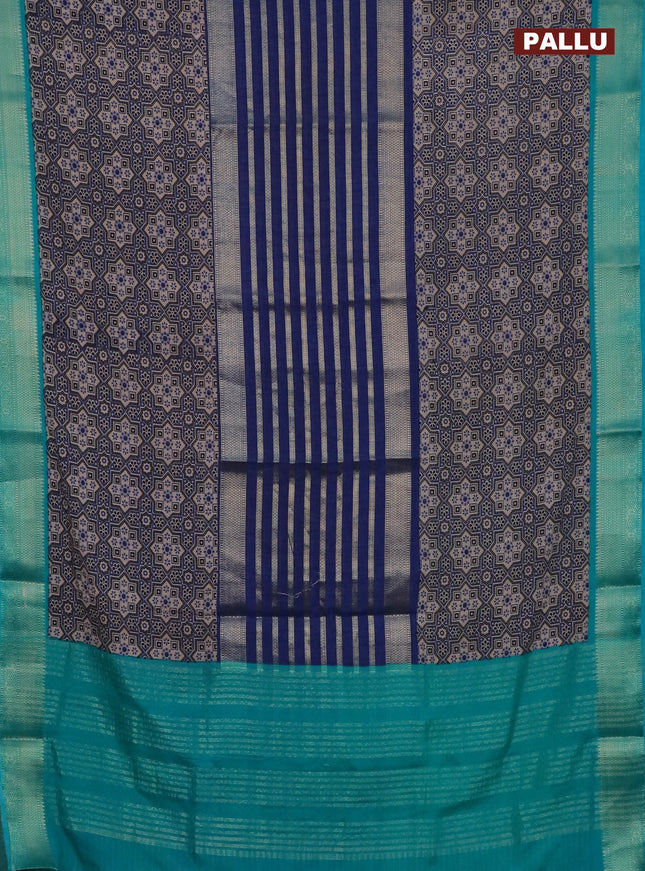 Semi crepe saree blue and teal blue shade with zari stripes & ajrakh prints and zari woven border