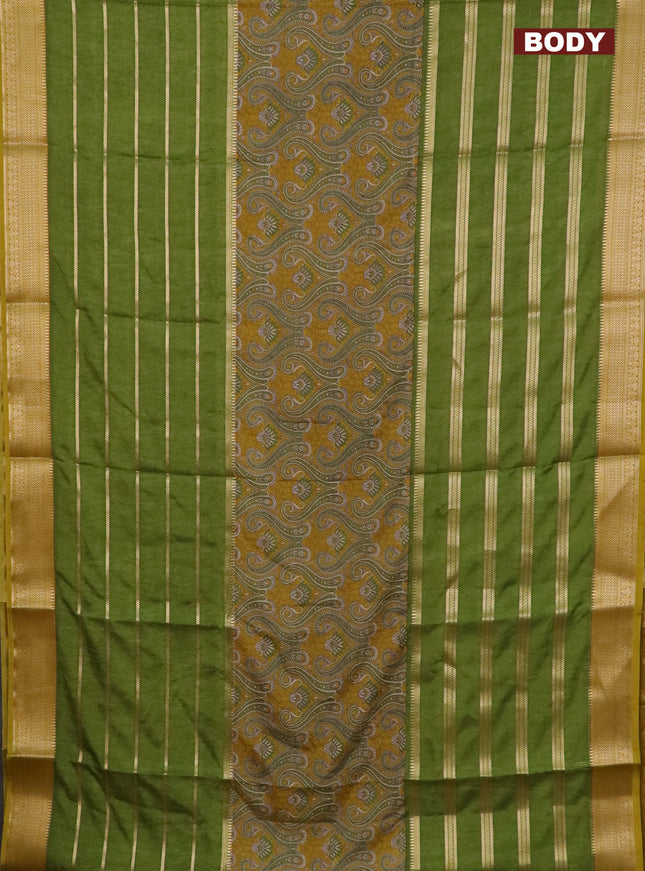 Semi crepe saree mehendi green and light green with kalamkari prints & zari stripes and zari woven border