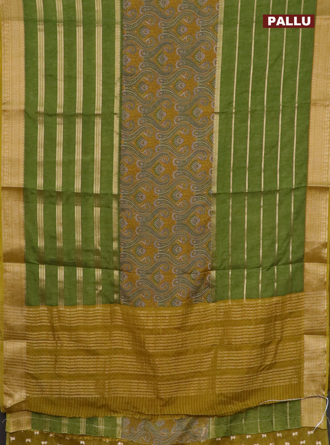 Semi crepe saree mehendi green and light green with kalamkari prints & zari stripes and zari woven border