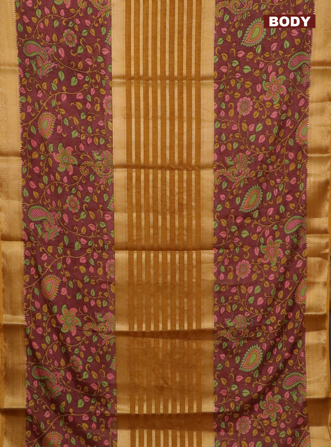 Semi crepe saree mustard yellow and brown shade with zari stripes & kalamkari prints and zari woven border