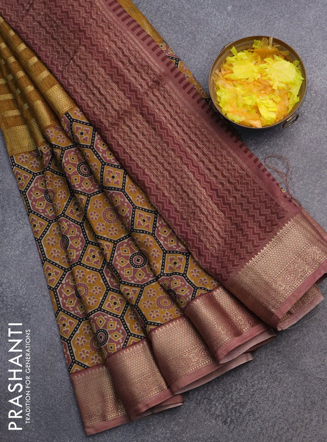 Semi crepe saree mustard yellow black and pastel brown with zari stripes & ajrakh prints and zari woven border
