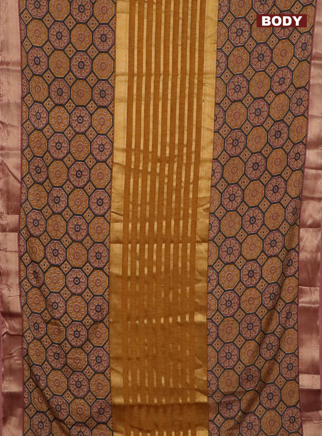 Semi crepe saree mustard yellow black and pastel brown with zari stripes & ajrakh prints and zari woven border