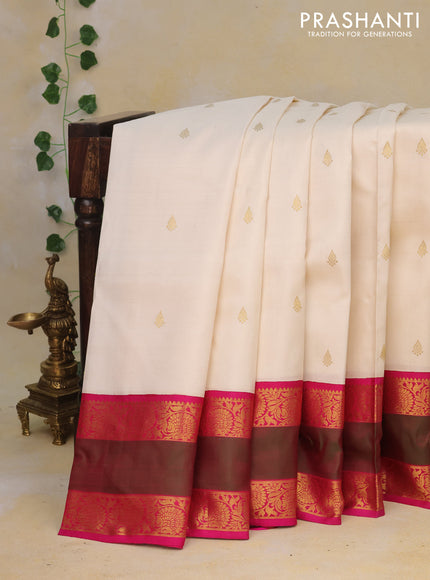 Pure kanchipuram silk saree off white and pink with zari woven buttas and rettapet zari woven border