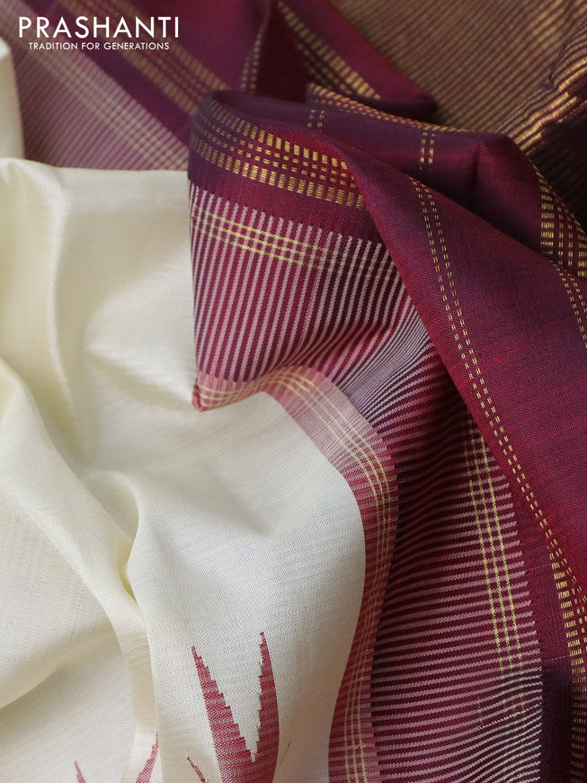 Pure kanchipuram silk saree cream and deep maroon with plain body and long temple design zari checked border