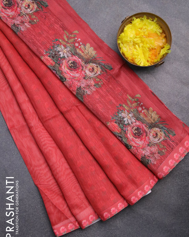 Linen cotton saree orange with plain body and floral prints & jute finish pallu