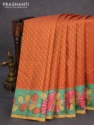 Pure kanchipuram silk saree rustic orange and teal blue shade with allover zari woven brocade weaves and kalamkari printed pallu & border