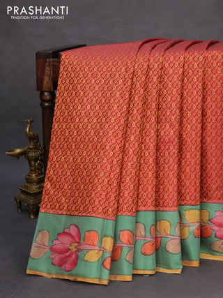 Pure kanchipuram silk saree maroon shade and pastel green shade with allover zari woven brocade weaves and kalamkari printed pallu & border