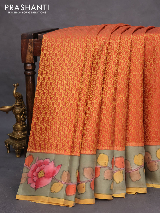 Pure kanchipuram silk saree rustic orange and grey shade with allover zari woven paisley brocade weaves and kalamkari printed pallu & border