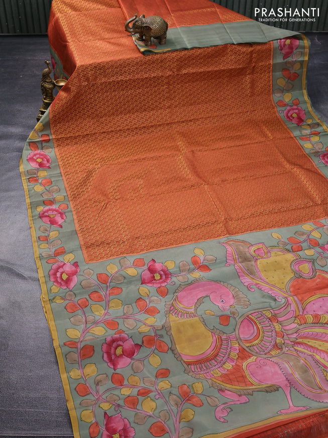 Pure kanchipuram silk saree rustic orange and grey shade with allover zari woven paisley brocade weaves and kalamkari printed pallu & border