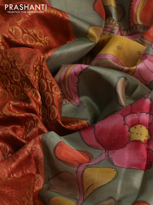 Pure kanchipuram silk saree rustic orange and grey shade with allover zari woven paisley brocade weaves and kalamkari printed pallu & border