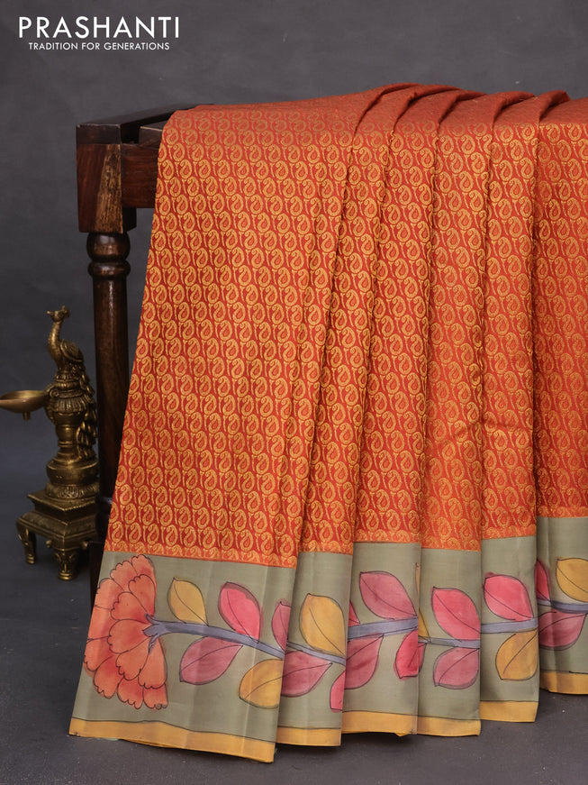 Pure kanchipuram silk saree rustic orange and grey shade with allover zari woven paisley brocade weaves and kalamkari printed pallu & border
